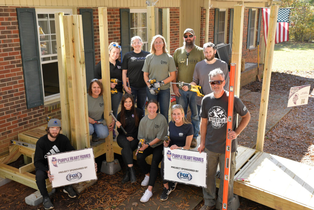 Fox Sports Volunteer Day:

Employees of Fox Sports team up with non profit Purple Heart Homes to help build a wheelchair accessible ramp for  Camp Centurion, a program that helps veterans transition from Military to Civilian life.